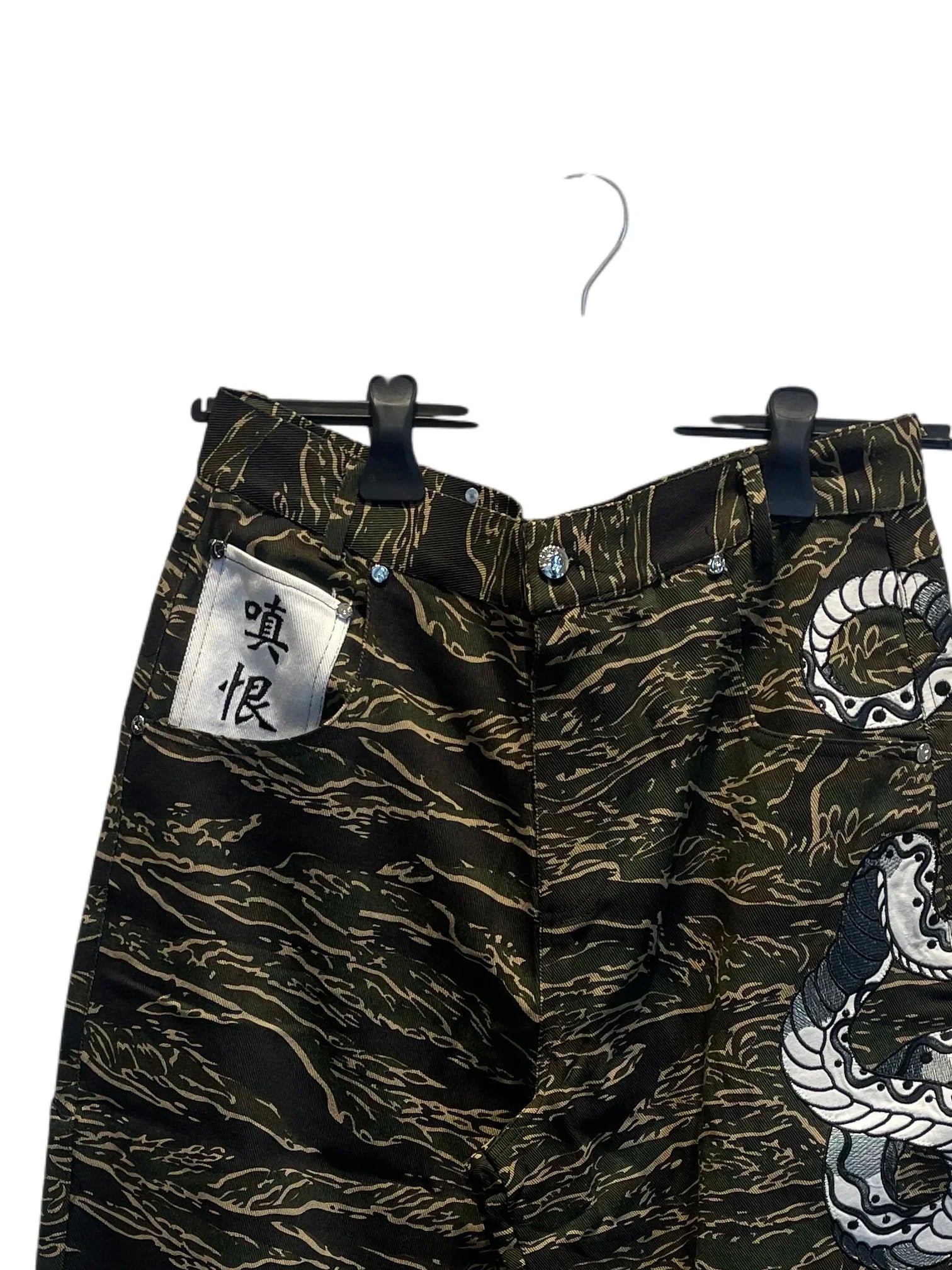 Dragon embroidered camouflage trousers Black